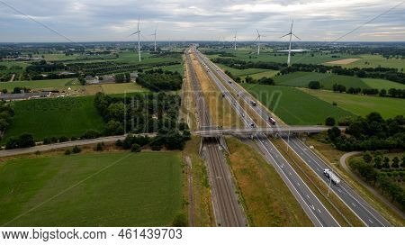 Brecht, Belgium, 6th Of July, 2022, Panoramic Aerial Drone View Of Wind Farm Or Wind Park, With High