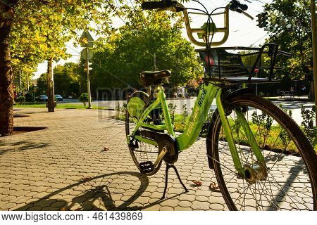 Yerevan, Armenia - May 28, 2021: Green Bicycle Stand In Street . Rental With A Qr Code At The Park. 