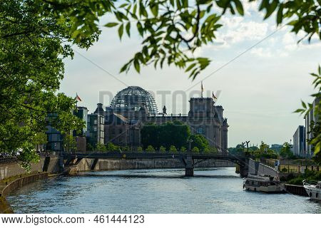 View Of The Reichstag In Berlin And The Marschall Bridge Which Spans The River Spree.