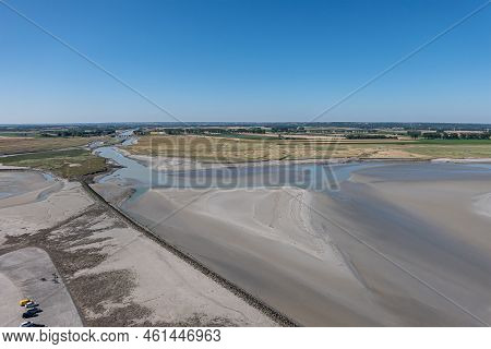 Mont St. Michel, Normandy, France - July 8, 2022: Seen From Top Of Rock, Blueish Couesnon River Cutt