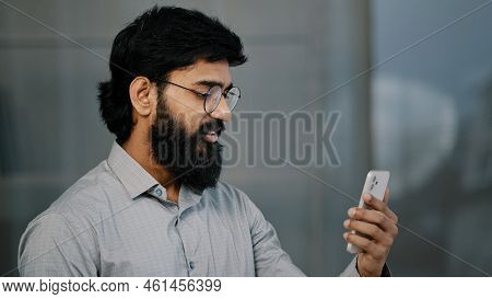 Arab Bearded Man Businessman Entrepreneur Investor Hold Video Communication With Business Partners F