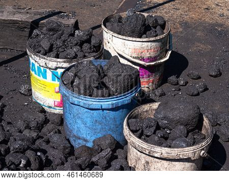 Gletsch, Switzerland - July 15, 2022: Buckets Of Coal, Ready For The Steam Train.