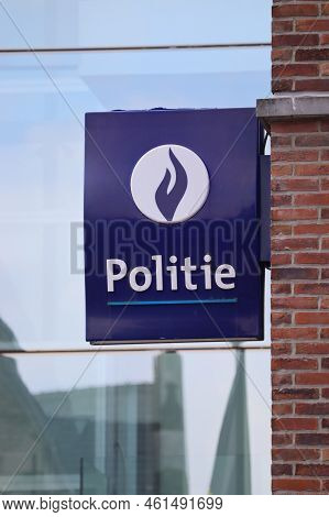 Laarne, Belgium, 11 September 2022: Dutch Language Logo Of The Belgian Police On A Sign On A Wall In
