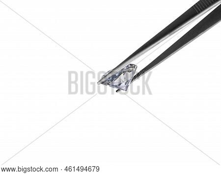Brilliant Cut Diamond Held By Tweezers. For Design