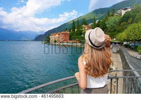 Holidays On Lake Como, Italy. Back View Of Relaxed Girl Enjoying Landscape On Lake Como, Italy.