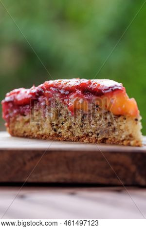 Plum Pie. Rustic Plum Cake On A Dark Wooden Background. High Quality Photo