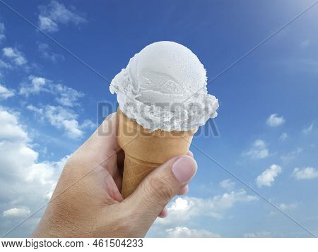 Ice Cream Cone Rising To The Hot Summer Sky