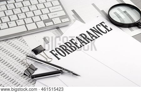 Forbearance Text On A Paper With Chart And Keyboard, Business Concept