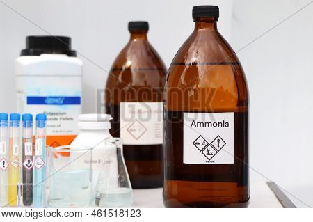 Ammonia In Bottle, Chemical In The Laboratory And Industry