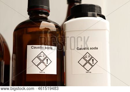 Caustic Soda In Bottle, Chemical In The Laboratory And Industry