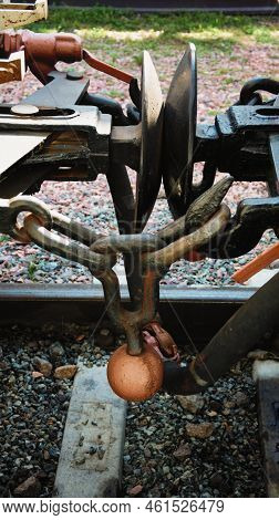 Close-up Detail Of Iron Connection Of Two Train Wagons. Railway Car Coupler And Train Buffers. Buffe