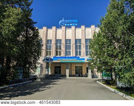 Noyabrsk, Russia - August 3, 2022: View Of The Building Of The Gazprom Neft Sports Complex Against T