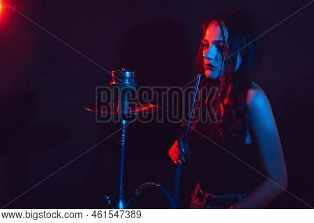 The Theme Of The Hookah, Sheesha. A Young Girl Gets The Pleasure Of Smoking Hookah