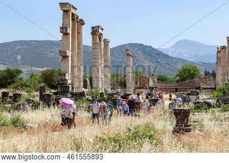 Geyre, Turkey - May 30, 2021: A Group Of Unidentified Tourists Visit The Ruins Of The Temple Of Aphr