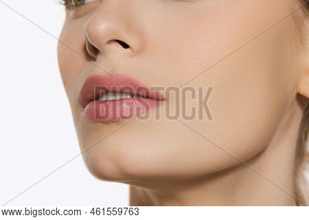 Closeup Female Lips, Cheeks And Nose Isolated Over White Studio Background. Concept Of Cosmetology, 