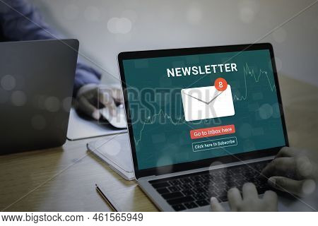 Businessman And Team Work Using A Laptop Computer With Subscribe Newsletter And Email Marketing Stra