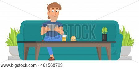 Man Sit On Couch At Coffee Table With Tablet. Guy Relaxing In Cafe