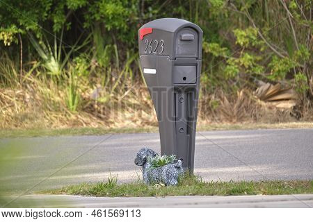 Typical American Outdoors Mail Box On Suburban Street Side.