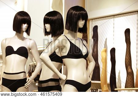 Female Mannequins In Black Underwear. Lingerie Store, Bra, Panties And Stockings In A Shop