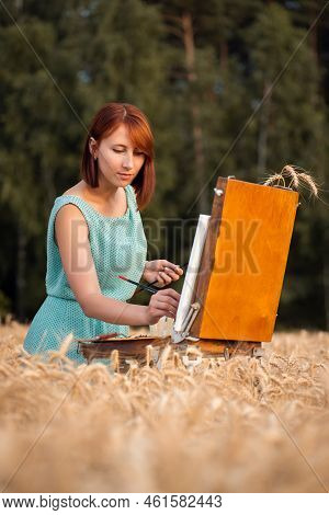Front View Of A Beautiful Artist Girl Full Of Inspiration, Drawing A Picture In Nature. Summertime, 