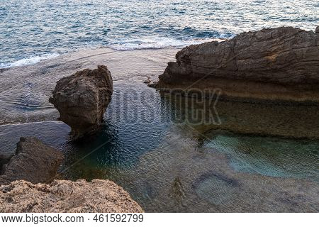 Stone Arch In The Stunning Lagoon Of Nahsholim Beach, Haifa Area Of Northern Israel.
