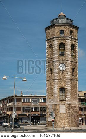 Europe, France, Dunkerque - July 9, 2022: Closeup Of Brown Stone Historic Clock Tower Called Le Leug