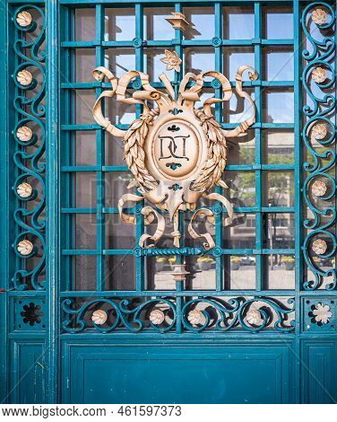 Europe, France, Dunkerque - July 9, 2022: Closeup Of Golden Coat Of Arms Set On Main Azure Metal-fra