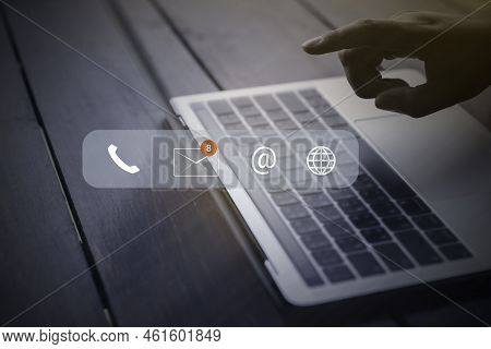 Contact Us Or Customer Support Hotline People Connect. Businessman Using A Laptop Computer With The 