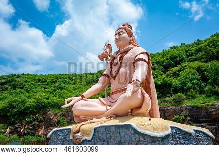 Hindu God Shiva Sculpture Sitting In Meditation. Yoga And Meditation Concept.