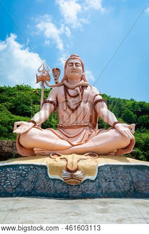 Hindu God Shiva Sculpture Sitting In Meditation. Yoga And Meditation Concept.