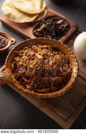Tinga De Res. Typical Mexican Dish Prepared Mainly With Shredded Beef, Onion And Dried Chilies. It I