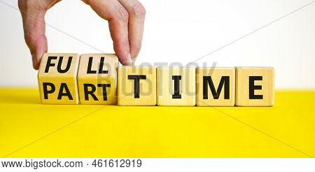 Full Or Part Time Symbol. Businessman Turns Wooden Cubes And Changes Words 'full-time' To 'part-time