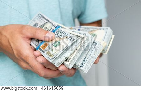 Man Of Hundred Dollar Bills Close Up. Stock Market Financial Illegal Freedom Exchange Earn Pile Rich