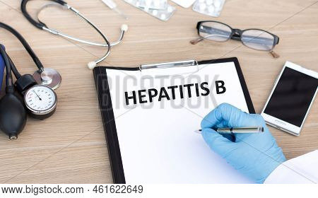 Doctor Writing Word Hepatits B With Marker, Medical Concept