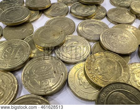 Turkish Coins Of 10 Kurus And 5 Kurus Standing In A Pile On A White Background