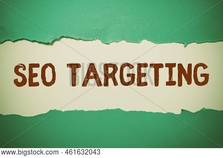 Hand Writing Sign Seo Targeting. Word Written On Specific Keywords For Location Landing Page Top Dom
