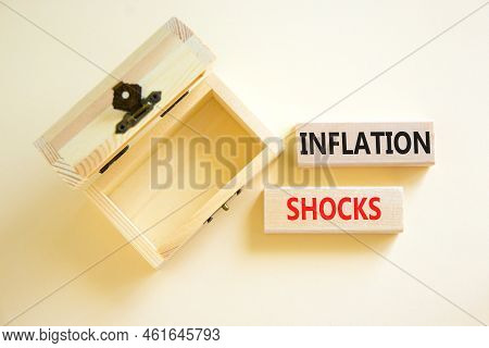 Inflation Shocks Symbol. Concept Words Inflation Shocks On Wooden Blocks. Beautiful White Table Whit