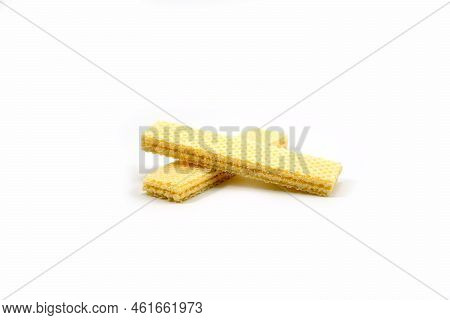 Delicious Wafer Sticks Arranged In A Pyramid Shape Isolated On A White