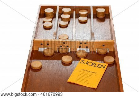 Amsterdam, The Netherlands, 09.09.2022, Dutch Table Shuffleboard Game Called Sjoelen With Game Rules