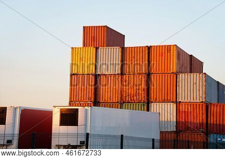 Cargo Containers Stacked High At Logistics Port Town Of Greenock