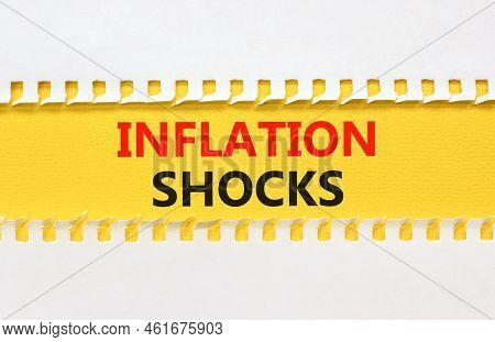 Inflation Shocks Symbol. Concept Words Inflation Shocks On Yellow And White Paper. Beautiful Yellow 