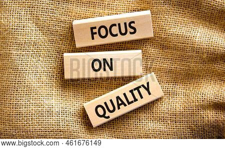 Focus On Quality Symbol. Concept Words Focus On Quality On Blocks On Beautiful Canvas Table Canvas B