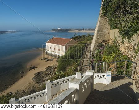 Idyllic View Of The Mouth Of Mira River Flowing Into The Atlantic Ocean With Stairs Leading To Port 