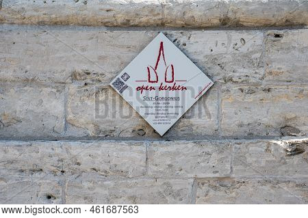 Hoegaarden, Flemish Brabant, Belgium, 08 02 2022 - Sign Of The Saint Gorgonius Open Church With The 