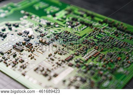 Close-up Shot Of Assebled Pcb Printed Circuit Board With Electrical Components Mounted Onto Its Surf
