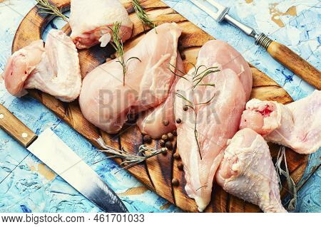 Uncooked Chicken Meat On Cutting Board