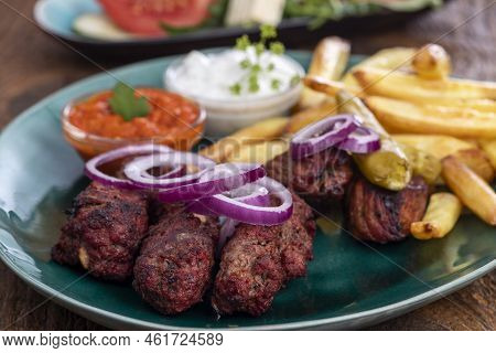 Overview Of Greek Bifteki With French Fries