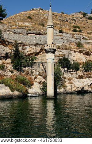 Landscape With The Euphrates River, Along Boat And Minaret Of The Flooded Halfeti Batik Camii Mosque