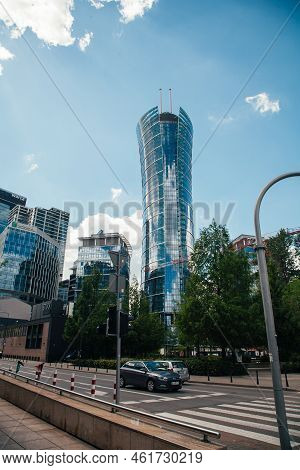 Warsaw, Poland - June 22, 2022: Landmark Architecture. Business Center. Neomodern Style. Street Road