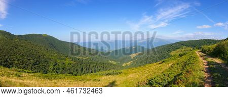 Panorama Of A Green Mountain Landscape. Wonderful View In To The Distant Valley In Morning Light. Ex
